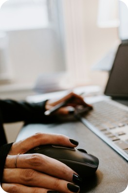 Employee using the keyboard and mouse.
